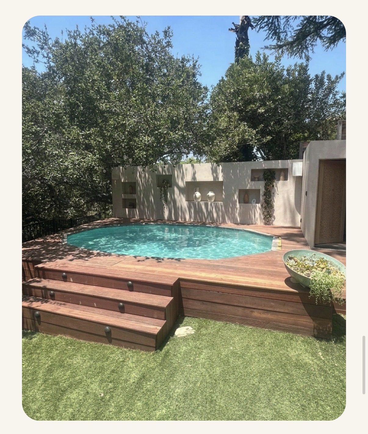 Warm-water pool on a wooden deck under oak trees in Woodland Hills